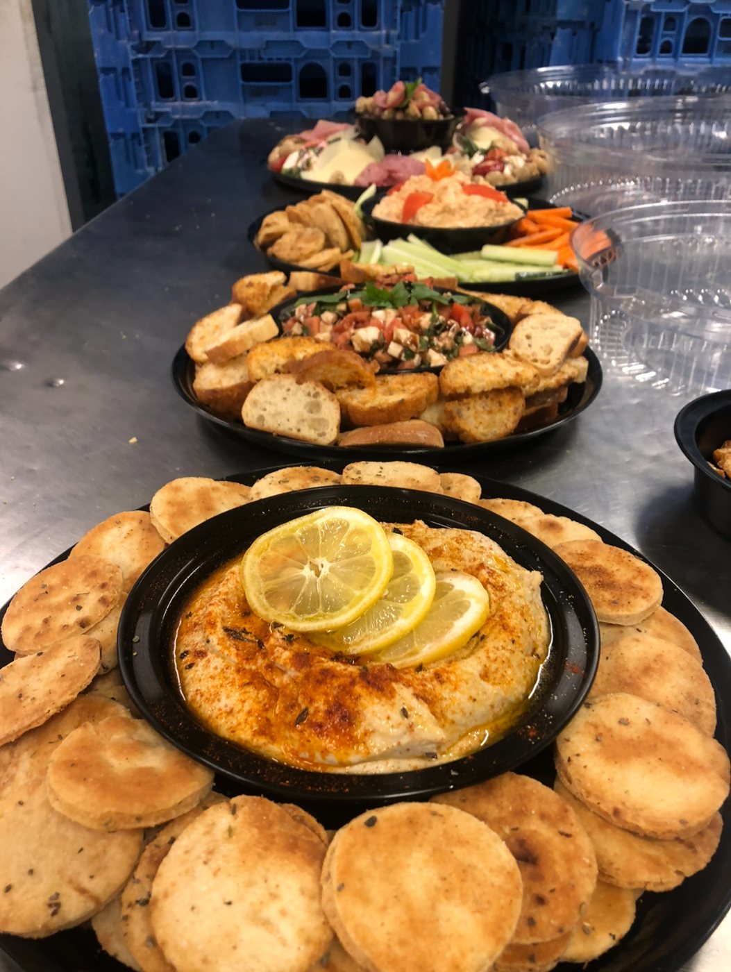 Dip platters with homemade pita chips and crostini
